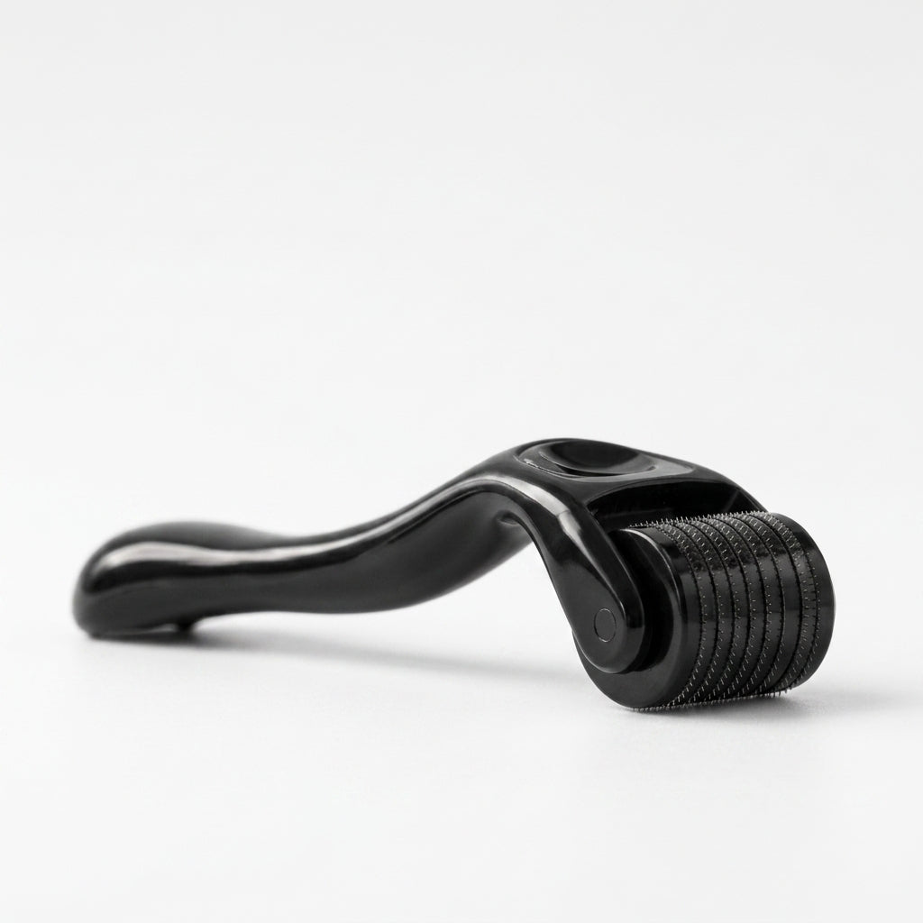 Black roller tool on a white background