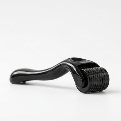 Black roller tool on a white background