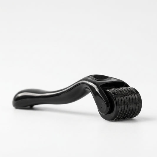 Black roller tool on a white background